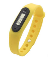 Pedometer Watch Wrist Watch in yellow silicone with digital display and adjustable strap.
